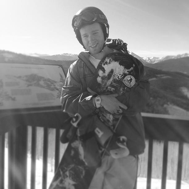 Picture Erik R. Miller snowboarding.